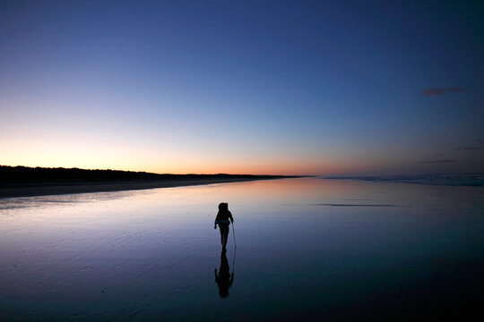 A man hiking alone with a backpack