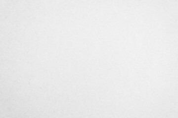 White recycled craft paper texture as background. Grey paper texture, Old vintage page or grunge vignette of old cardboard.
