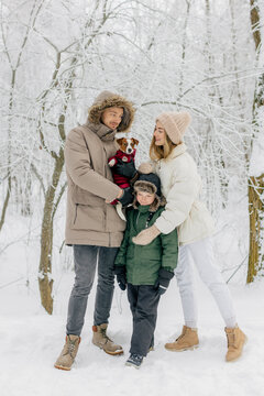 Happy Family In Winter Forest