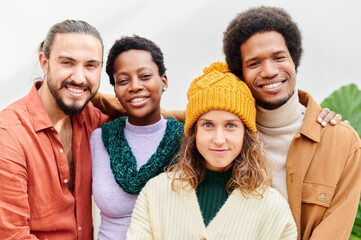Diverse friends smiling outdoors