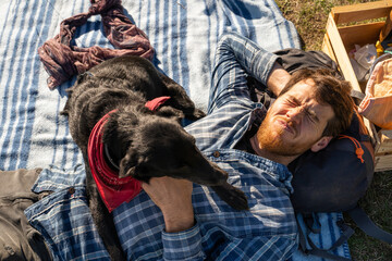 Man and his dog making funny face