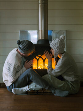 Couple near fire place 