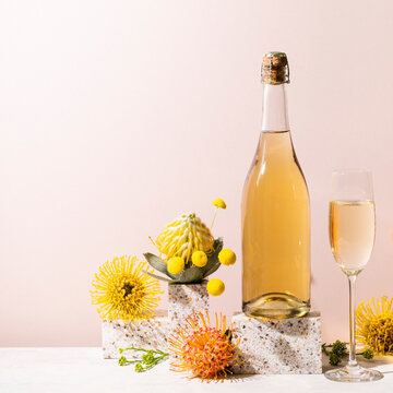 Champagne bottle still life with flowers