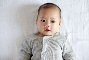 Closeup expression of Asian newborn baby