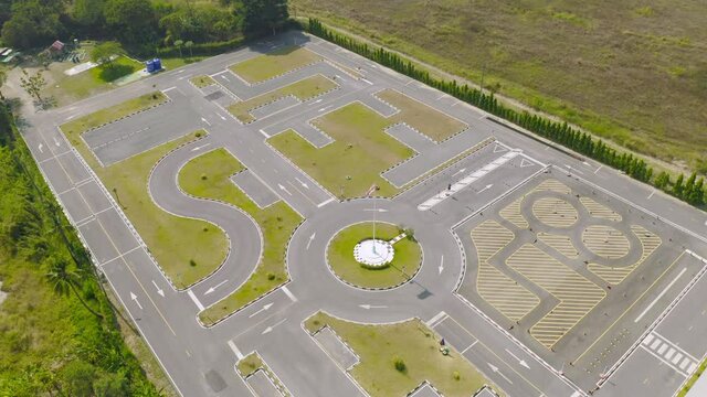 Aerial top view of a car driving test center with street road. Course field, practice vehicle school.  Map site design.