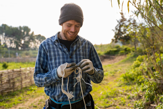 Man assembling electric shepherd