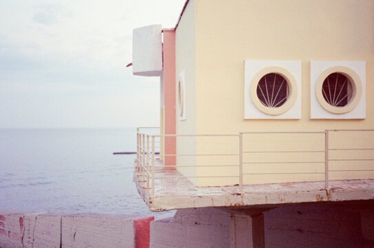 Seashore, a pier and a guardhouse with round windows