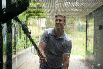 Window cleaner washing glass sliding doors