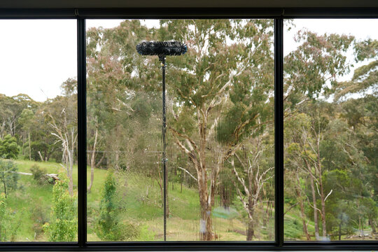 Extender pole used to reach high window