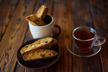Homemade Italian cranberry and nuts biscotti and cup of tea