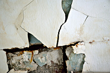 cracks in the walls of the house concept The strength of the building structure.