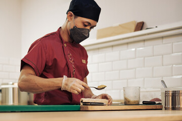 Chef cooking sushi in a restaurant
