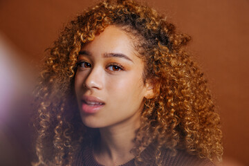 Gorgeous young woman in bright light