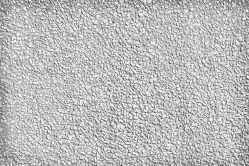 Fototapeta premium White small rock in seamless patterns decorative on concrete wall on grey background