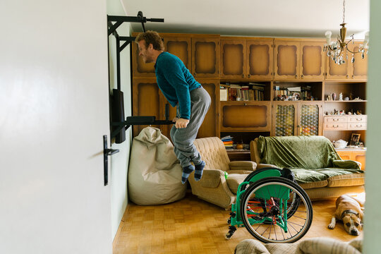 Disabled Man Doing Dips At Home