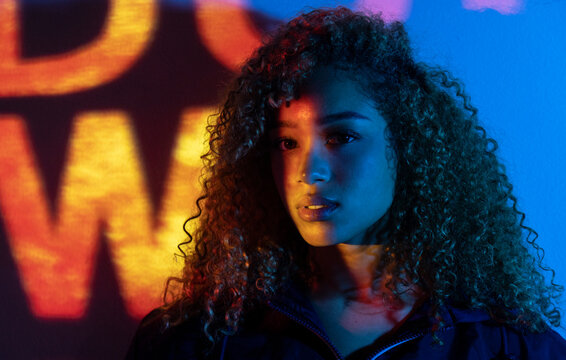 Stylish young woman in trendy outfit