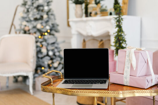 Laptop on table for Christmas dinner