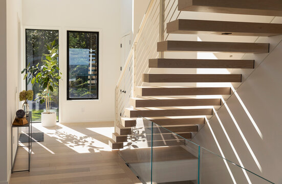 Elegant Modern Stairway in foyer of Design Home 