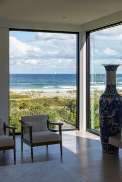 Sailboat on Sea seen from inside Luxury Home