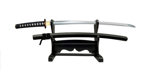 Japanese sword on double  display stand on white background