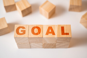 Goal word on wood block. Business concept