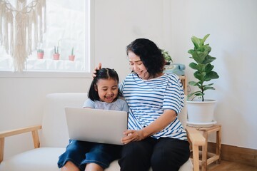 couple using laptop at home