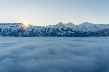 Sunrise in the snowy alps of Switzerland.