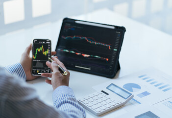Businessman Investment Entrepreneur Trading discussion and analysis graph stock market trading,stock chart concept.