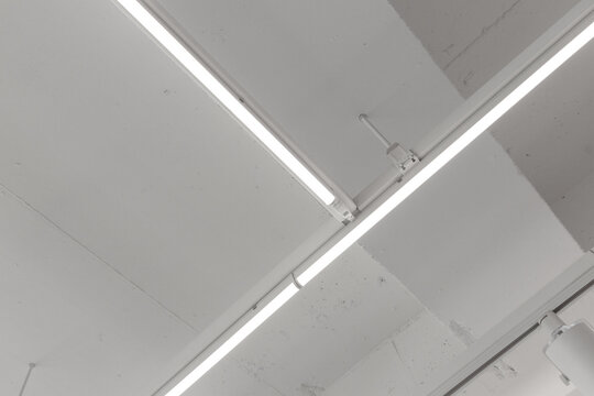 Close-up of a long lamp on the ceiling.