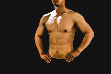 Fototapeta premium 筋肉を鍛える男性（上半身） 