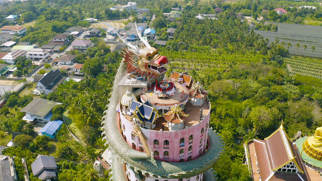 Aerial view of Wat Samphran or Chinese Dragon Temple in Sam Phran District in Nakhon Pathom province near Bangkok Urban City, Thailand. Tourist attraction landmark in travel trip concept.