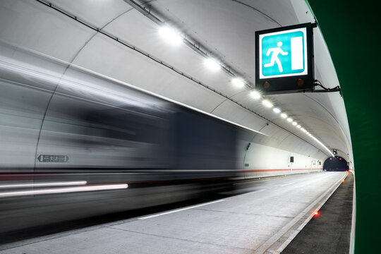 Fast truck in a tunnel with exit sign 