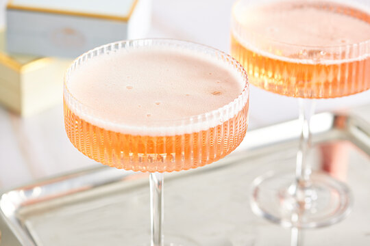 Closeup View of Glasses of Pink Champagne 