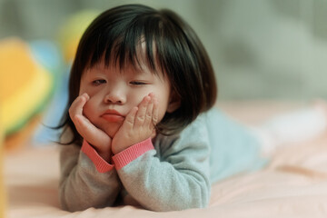 cute little child making funny face
