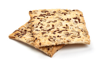Crispy bread with sesame and flax seeds, crackers, isolated on white background.