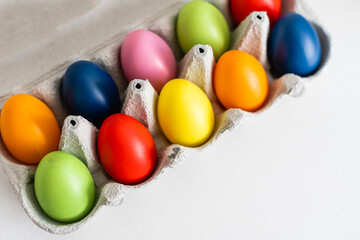 Fototapeta na wymiar Colorful Easter Egg bottom border over a background. Copy space
