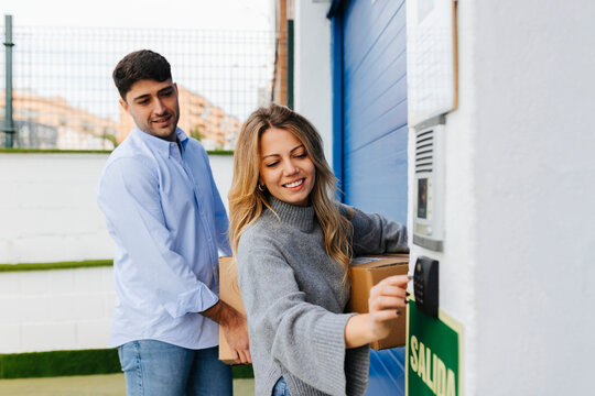Young couple opening a