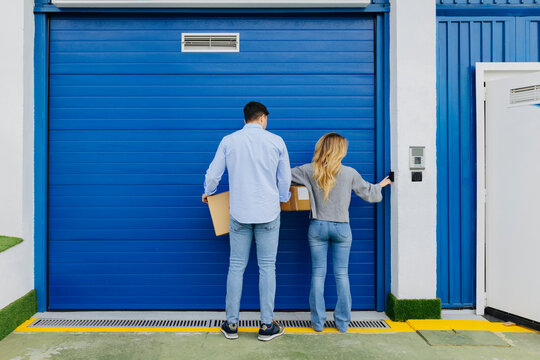 Young couple opening a