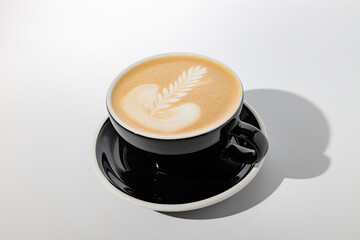 Espresso based coffee drink with addition of warmed milk