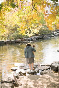 Plus Size Son Holding Toddler Son Riverside in Colorado