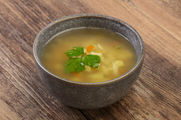 Tasty chicken soup with carrot