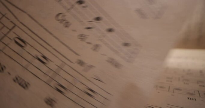 Vintage Sheet Music. Camera moving over a music sheet showing notes. Close up of music notes on a paper