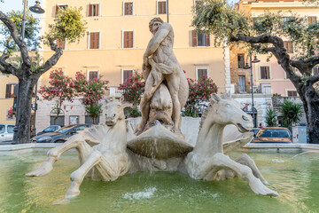 The Fountain of Neptune, symbol of the city that bears the name of the pagan god of the sea, is located in Nettuno, ,old town of Neptune, Rome, Italy