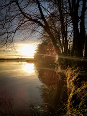 sunrise over the river © Jacek