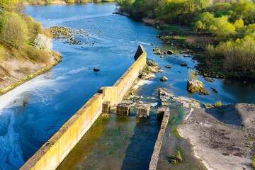 Summer landscape a dam of hydroelectric power station