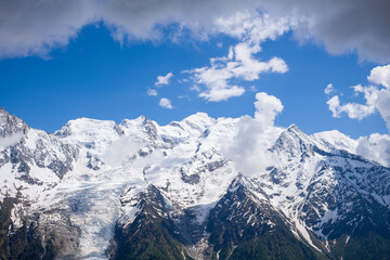 Snow on the Mont Blanc Massif in the Mont Blanc Massif in Europe, France, the Alps, towards Chamonix, in summer on a sunny day.