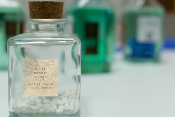 Antique bottle of early 20th century with morphine pills