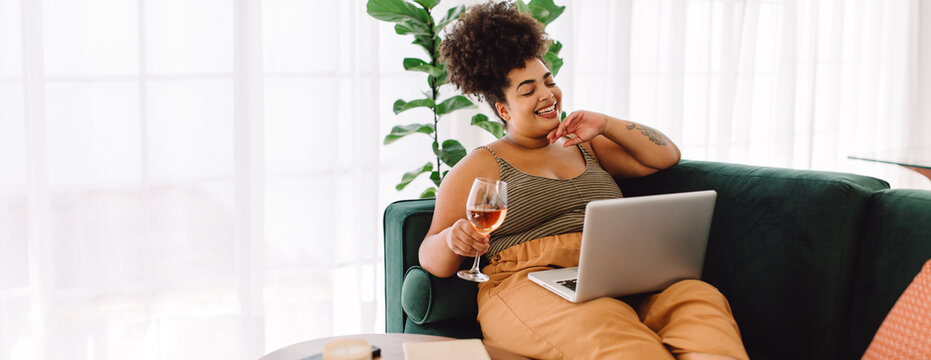 Woman Having A Virtual Party With Friends At Home