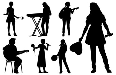 Fototapeta premium Silhouette of a girl singing with microphone, playing guitar and synthesizer, set of vector silhouettes.