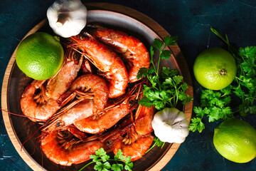 Fried langoustines and shrimps on a plate. Pickled in garlic and lime.